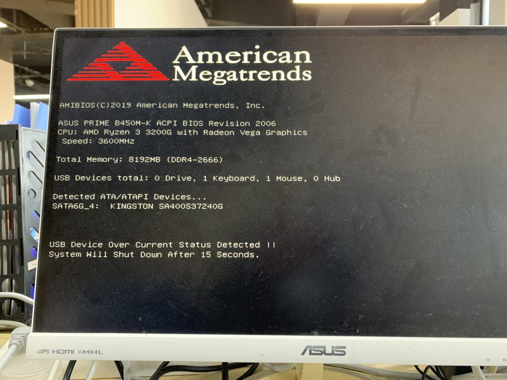 电脑开机提示“usb device over current status detected”关机